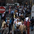 Looking west along Wall Street during the morning rush hour by the New York Stock Exchange in Manhattan. Image shot 2007. Exact date unknown.