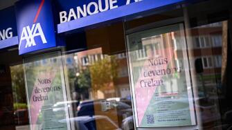 Ixelles, Belgium. 29th May, 2024. Illustration picture shows an office of the AXA bank in Brussels, Monday 27 May 2024. AXA and Crelan decided to merge together into Crelan in june. BELGA PHOTO LAURIE DIEFFEMBACQ Credit: Belga News Agency/Alamy Live News