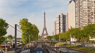 France, Paris, Train Station with High-rise Buildings on the Left Bank and Eiffel Tower