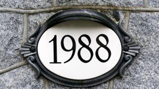 1988 house number on ornate oval plaque