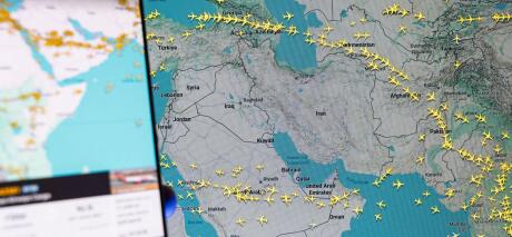 Flightradar24 mobile app displaying real-time global flight tracking map over the Middle East and Iran, aviation monitoring and commercial air traffic