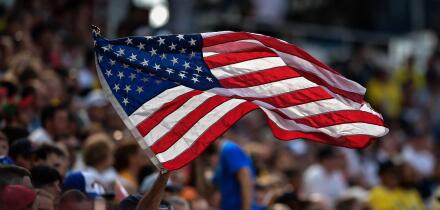 A football fan waves a U.S. flag in the Group F match between Sweden and South Korea during the FIFA World Cup 2018 in Nizhny Novgorod, Russia, 18 Jun