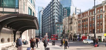 People in Bishopsgate, City of London street scene, looking towards the RBS building, Spitalfields East London UK