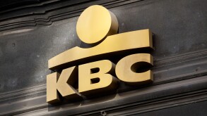 Gold KBC Bank logo on facade in Brussels, Belgium
