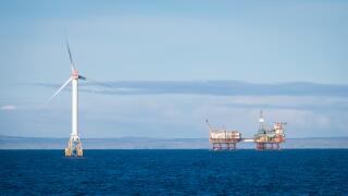 Wind Turbine Generators of the Beatrice Demonstration Project and Beatrice A oil platform in the Moray Firth, Scotland