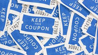 close up of blue and white keep this coupon numbered raffle tickets background