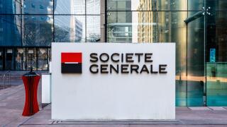 Sign of the Societe Generale at the entrance of the head office of the french banking group in La Defense business district.