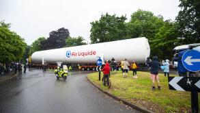 An empty colossal-sized ?Air Liquide? medical grade oxygen tank being transported on a 164ft (50m) lorry across Four Oaks, Sutton Coldfield.