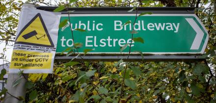 Public Bridleway sign near Elstree, Hertforshire, with notice about CCTV to deter fly-tipping