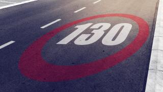 130 kmph or mph driving speed limit sign on highway, road safety and preventing traffic accident concept.