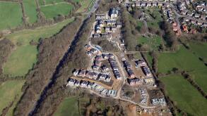 aerial view of new housing being built by Stonewater Homes near Horsforth Cemetery, Leeds