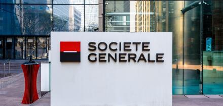 Sign of the Societe Generale at the entrance of the head office of the french banking group in La Defense business district.
