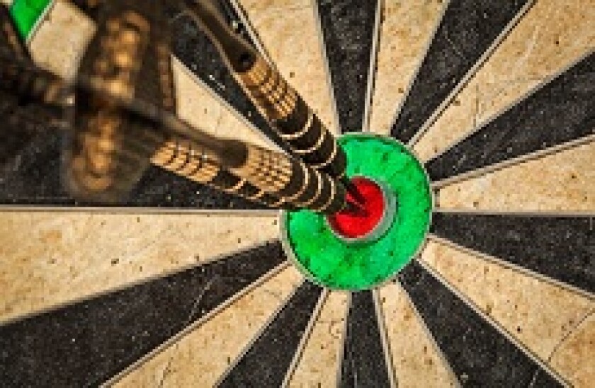 Three darts in bullseye 230x150