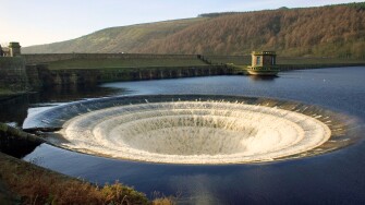 An overflow on Ladybower reservoir Derbyshire UK