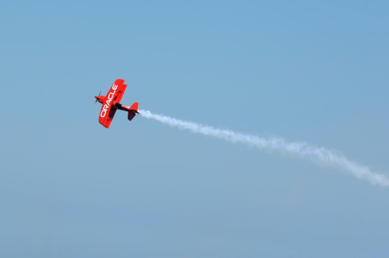 The Oracle stunt biplane climbs into the skies at the 2010 Chicago Air and Water Show.