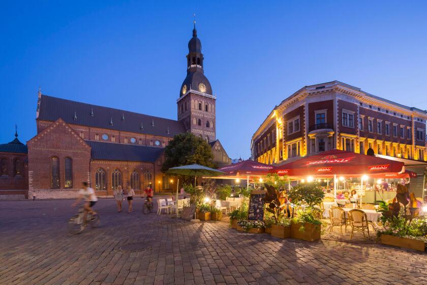 Latvia (Baltic States), Riga, European capital of culture 2014, historical centre listed as World Heritage by UNESCO, terrasses in the city center and the Dome cathedrale