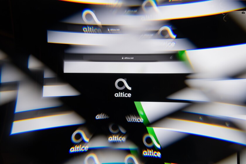 Milan, Italy - APRIL 10, 2021: Altice logo on laptop screen seen through an optical prism. Dynamic and unique image from Altice website. Illustrative editorial.