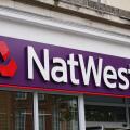 NatWest bank logo and signage of high street branch. Banking group in the UK - Southampton England 14 September 2022