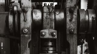 heavy industry old grunge steel machinery mechanical engineering machine closeup black and white for background