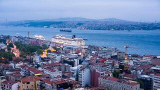 Bosphorus Strait and cruise ship at night seen from Galata Tower, Istanbul, Turkey, Europe