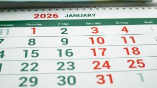 January 2026 calendar page with highlighted weekend days close view on table