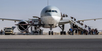 2GEC26W US Embassy personnel from Afghanistan board a Qatar Airways flight to Kuwait.jpg