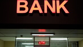 A Bank neon sign. 