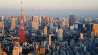Tokyo Tower and city skyline at sunset, Minato district, Tokyo, Japan