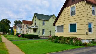 Two story houses in residential neighbourhood village of Painted Post outskirts of Corning NY, USA