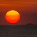 sun with sunspots setting over the Pacific Ocean, Costa Rica, Pazifikkueste