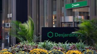 The Desjardins Group logo is seen out front of an office building in downtown Toronto.