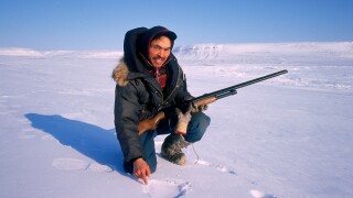 Hunter, Polar bear tracking, Franklin Island, Nunavut, Canada