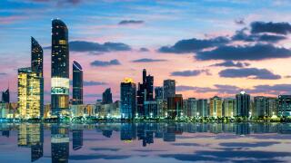 View of Abu Dhabi Skyline at sunset, United Arab Emirates