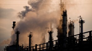 Oil and gas refinery smokestacks