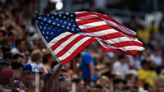 A football fan waves a U.S. flag in the Group F match between Sweden and South Korea during the FIFA World Cup 2018 in Nizhny Novgorod, Russia, 18 Jun