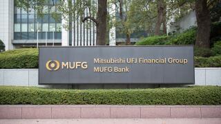 MUFG - Mitsubishi UFJ Financial Group Company sign in front of the Head office in Chiyoda City.