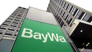 (dpa) - The logo of BayWa, Europe's leading building materials group and agricultural retailer, is seen in front of the administrative building in Munich, Germany, 10 November 2003. Despite the long hot summer and the sluggish economy, the company increas