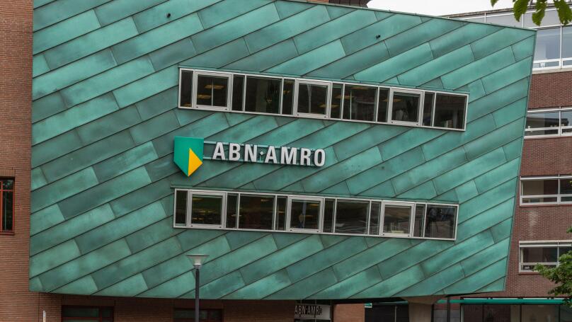 ABN AMRO bank brand logo on a local branch in the city of Amersfoort in the Netherlands.
