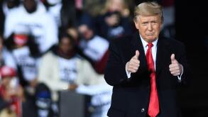 U.S. President Donald Trump gives a thumbs up after speaking at a Republican National Committee Victory Rally in support of incumbent Republican Senate candidates Sen. Kelly Loeffler (R-GA) and Sen. David Perdue (R-GA) at the Dalton Regional Airport.