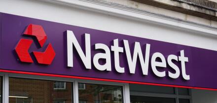 NatWest bank logo and signage of high street branch. Banking group in the UK - Southampton England 14 September 2022