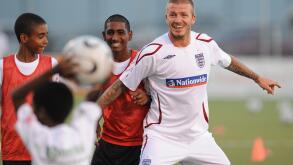 England's David Beckham during a soccer clinic for local school children at the Marvin Lee Stadium, Port of Spain, Trinidad.