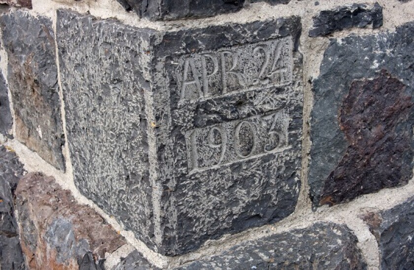 Cornerstone laid by President Theodore Roosevelt at entrance arch to Yellowstone National Park, Gardiner, Montana, USA
