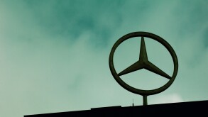 The Mercedes Benz logo on top of building Berlin Germany