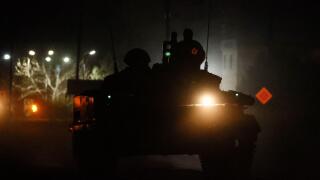 Crimea, Russia. 24th Feb, 2022. Russian soldiers and military hardware are seen in northern Crimea near the Perekop crossing on the Russian-Ukrainian border. Early on 24 February, Russia's President Putin announced his decision to launch a special militar