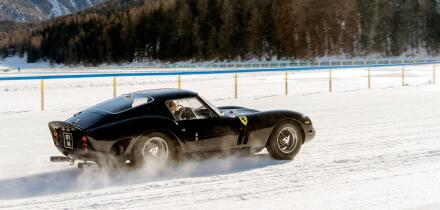 Classic vintage antique sports cars racing on the frozen lake of St Moritz