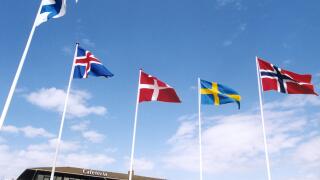 NORDIC FLAGS against blue sky ,Finland,Iceland,Denmark,Sweden,and Norway