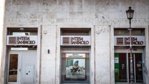 ROME, ITALY - JUNE 15, 2024: Intesa Sanpaolo logo displayed on the facade of their bank branch in Rome, Italy. Intesa sanpaolo is an italian bank, the
