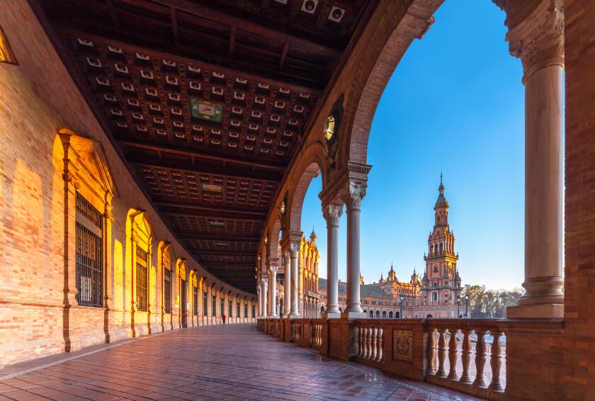 Plaza de Espana Seville Spain Sevilla, at sunset. View towards the South tower of the main building.