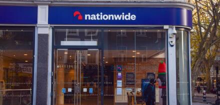 London, UK. 5th December 2025. A person walks past a Nationwide Building Society branch in Tottenham Court Road. Credit: Vuk Valcic/Alamy
