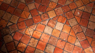 Antique terracotta floor tiles.